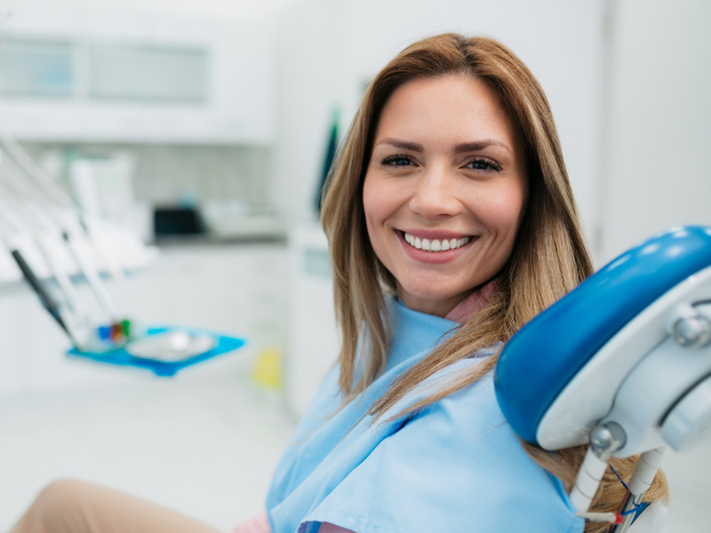 lady smiling in dental chair