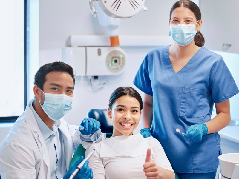 patient and dentist smiling